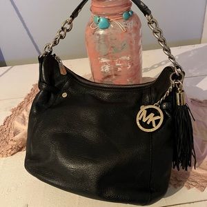 Michael Kors Megan black pebbled leather handbag with tassel